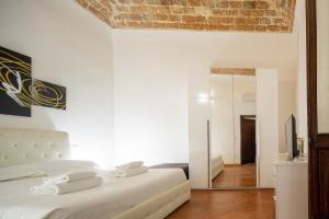 Voodi või voodid majutusasutuse Lian Home in Florence toas