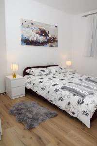 Postel nebo postele na pokoji v ubytování Apartman Zen