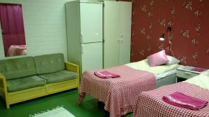Postel nebo postele na pokoji v ubytování Motel Ruskalinna