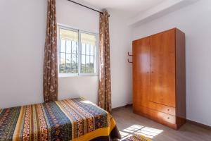 Posteľ alebo postele v izbe v ubytovaní Cortijo Tomé