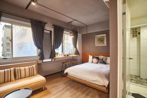 Postel nebo postele na pokoji v ubytování 109台北旅館-台北109青旅 109 Taipei Hotel - Taipei 109 Hostel