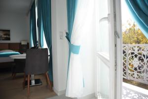 Postel nebo postele na pokoji v ubytování A&F Hotel Chemnitz