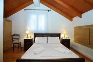 Ένα ή περισσότερα κρεβάτια σε δωμάτιο στο Kydonies Villas