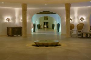 a large room with a large bowl in the middle of the room at Swahili Beach in Diani Beach