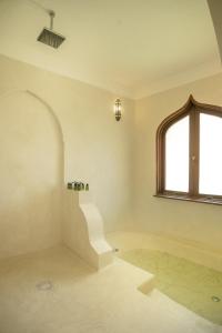 Een badkamer bij Swahili Beach