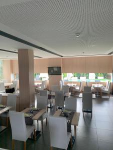 TV a/nebo společenská místnost v ubytování Hotel Sercotel Plana Parc