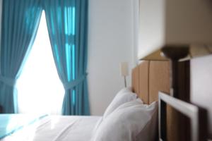 Postel nebo postele na pokoji v ubytování A&F Hotel Chemnitz