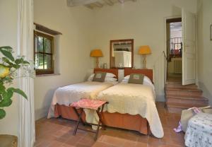 A bed or beds in a room at Casa Dell'Ambasciatore