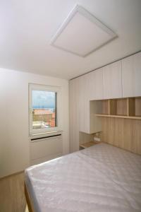 Voodi või voodid majutusasutuse Magic Stone Apartments toas