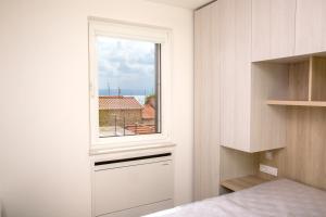 Voodi või voodid majutusasutuse Magic Stone Apartments toas