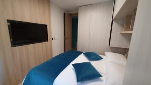 Voodi või voodid majutusasutuse Magic Stone Apartments toas