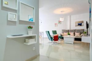 Et tv og/eller underholdning på Apartamento Las Palmeras