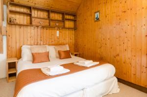 Postel nebo postele na pokoji v ubytování Hotel Sylvana