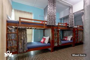 Postel nebo postele na pokoji v ubytování Island Backpackers + 37 fotografií