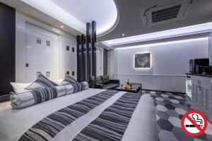 Voodi või voodid majutusasutuse HOTEL Dior7 toas