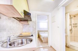 Kúpeľňa v ubytovaní Apartments Gracija + 37 fotografií