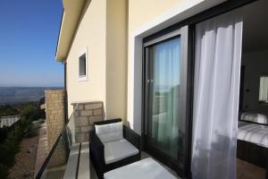 Balkón nebo terasa v ubytování Villa Infinity