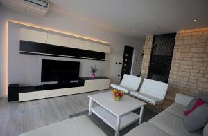 Posezení v ubytování Villa Infinity