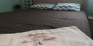 Łóżko lub łóżka w pokoju w obiekcie Apartment Joanna Grau de Gandia