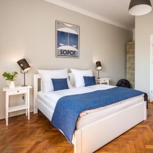Posteľ alebo postele v izbe v ubytovaní Sereno Apartments