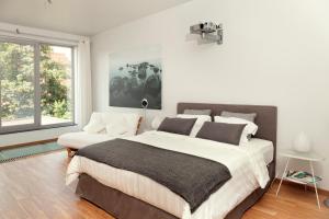 Katil atau katil-katil dalam bilik di Inblauw - Exclusive Wellness B&B