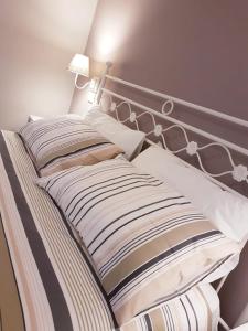 Ένα ή περισσότερα κρεβάτια σε δωμάτιο στο Sweet Saragozza apartment