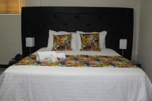Postel nebo postele na pokoji v ubytování Hotel Cafeira