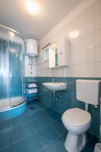 Ванная комната в Apartments Amneris