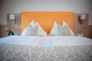 Łóżko lub łóżka w pokoju w obiekcie Hotel Restaurant Thadeushof