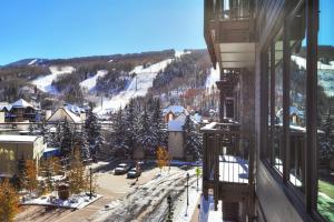 a large building with a ski lift on top of it at The Arrabelle at Vail Square, a RockResort in Vail