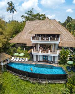 an aerial view of a villa with a swimming pool at The Manipura Luxury Estate and Spa Up to 18 person, fully serviced in Ubud