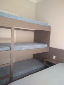 Tempat tidur susun dalam kamar di Casa da Canastra