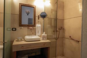 Koupelna v ubytování Hotel Boutique Don Pepe