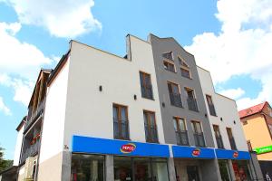 Budova, kde se apartmán nachází + 6 fotografií