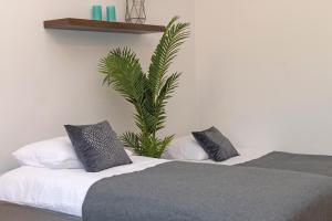 Posteľ alebo postele v izbe v ubytovaní 3D Wawel Apartament