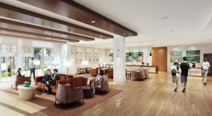 a lobby of a hotel with people sitting in chairs at Estrella At Casino Del Sol in Tucson