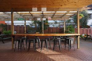 Peppertree Lodge餐厅或其他用餐的地方