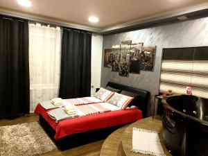 Ένα ή περισσότερα κρεβάτια σε δωμάτιο στο Ceca Apartman