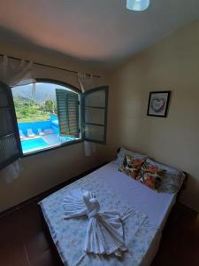 Cama o camas de una habitación en Residencial Rosi