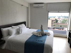 Letto o letti in una camera di Hotel Ros Gaud