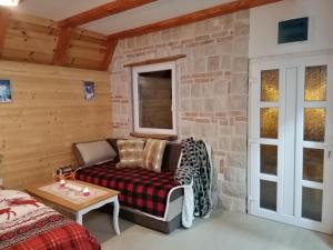 Letto o letti in una camera di Apartmani RUNOLIST