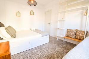 Posteľ alebo postele v izbe v ubytovaní P&P Apartaments Arapiles