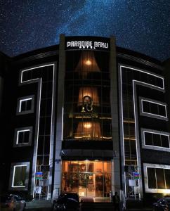 a building with a starry sky in front of it at Paradise Hotel Baku in Baku