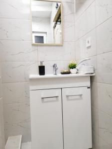 Cucina o angolo cottura di Apartmani RUNOLIST