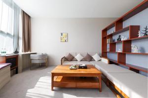 Posezení v ubytování Shanghai Menglong Hotel Management + 37 fotografií