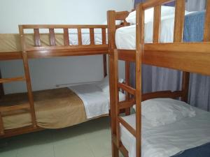 BACHÍG Hospedaje客房内的一张或多张床位