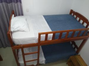 BACHÍG Hospedaje客房内的一张或多张床位