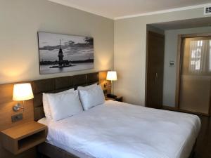 Postel nebo postele na pokoji v ubytování Hotel Fehmi Bey - Special Category