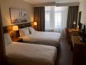 Postel nebo postele na pokoji v ubytování Hotel Fehmi Bey - Special Category