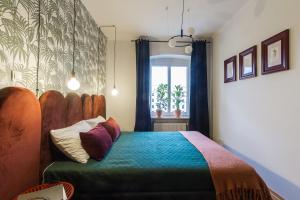 Łóżko lub łóżka w pokoju w obiekcie House Apartments Centrum Poznań